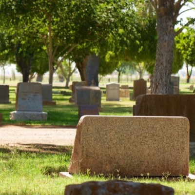 Backside of several tombstones