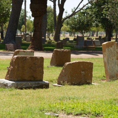 Backside of several tombstones