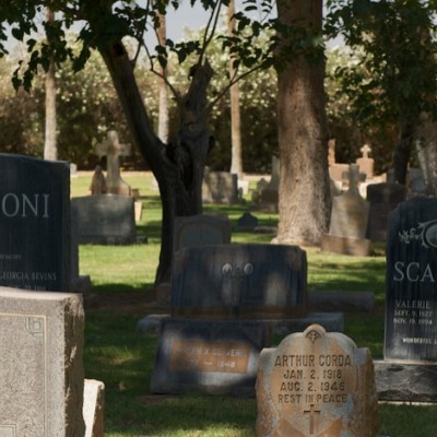 Close up of tombstones. Maggio, Barioni and Scaroni family names are visible.